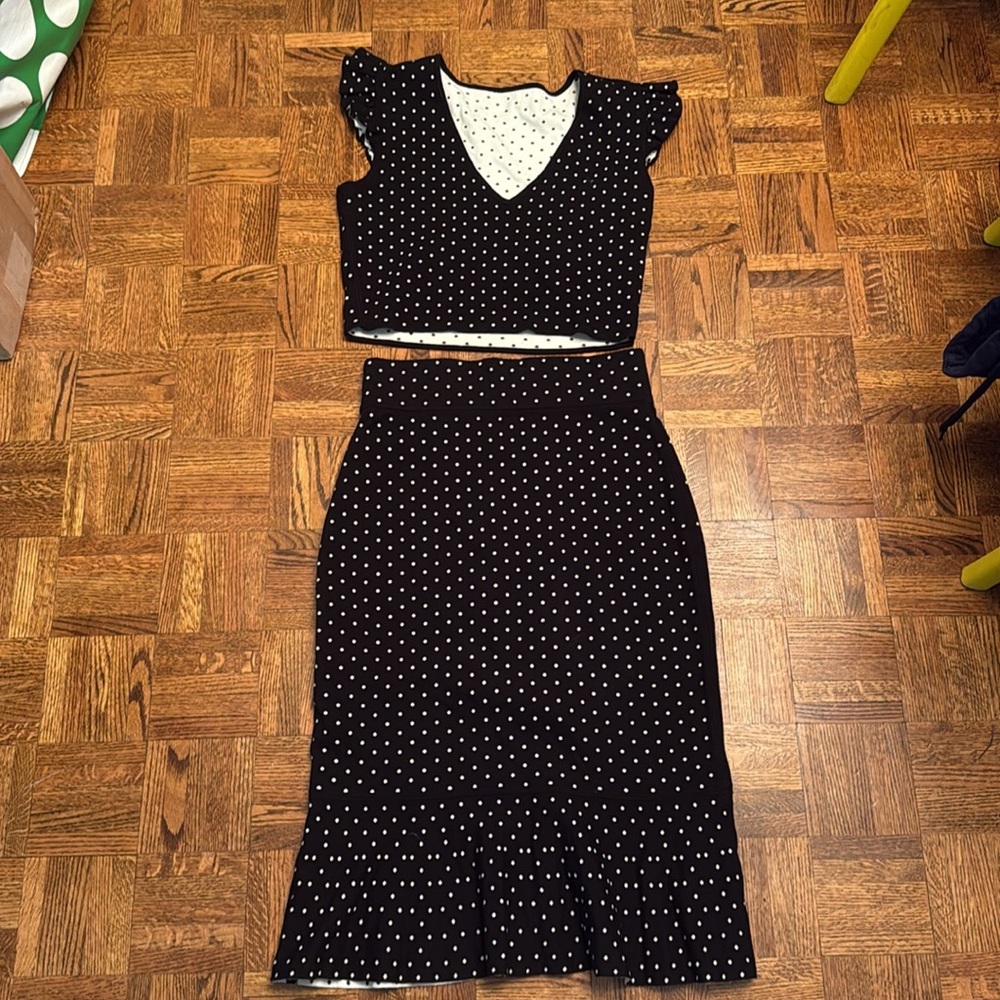 Reversible black and white polka dot top with frill sleeve and matching skirt